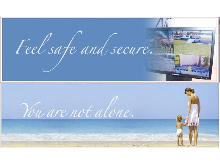 mother and child looking at ocean - caption - 'you are not alone' and 'feel safe and secure'